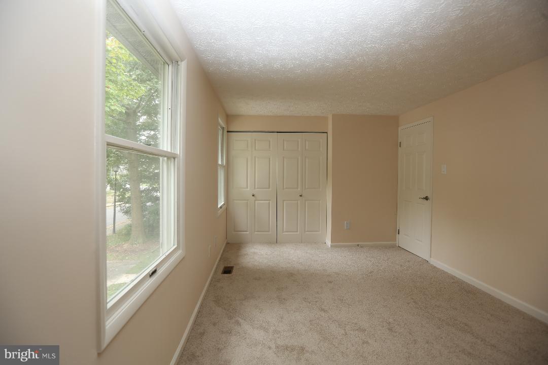 8338 Windfall Road Springfield, VA 22153 - Photo 9 of 28 Large Bedroom with Wall Closet, Windows and Light