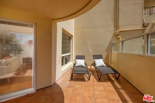 a room with furniture and a window