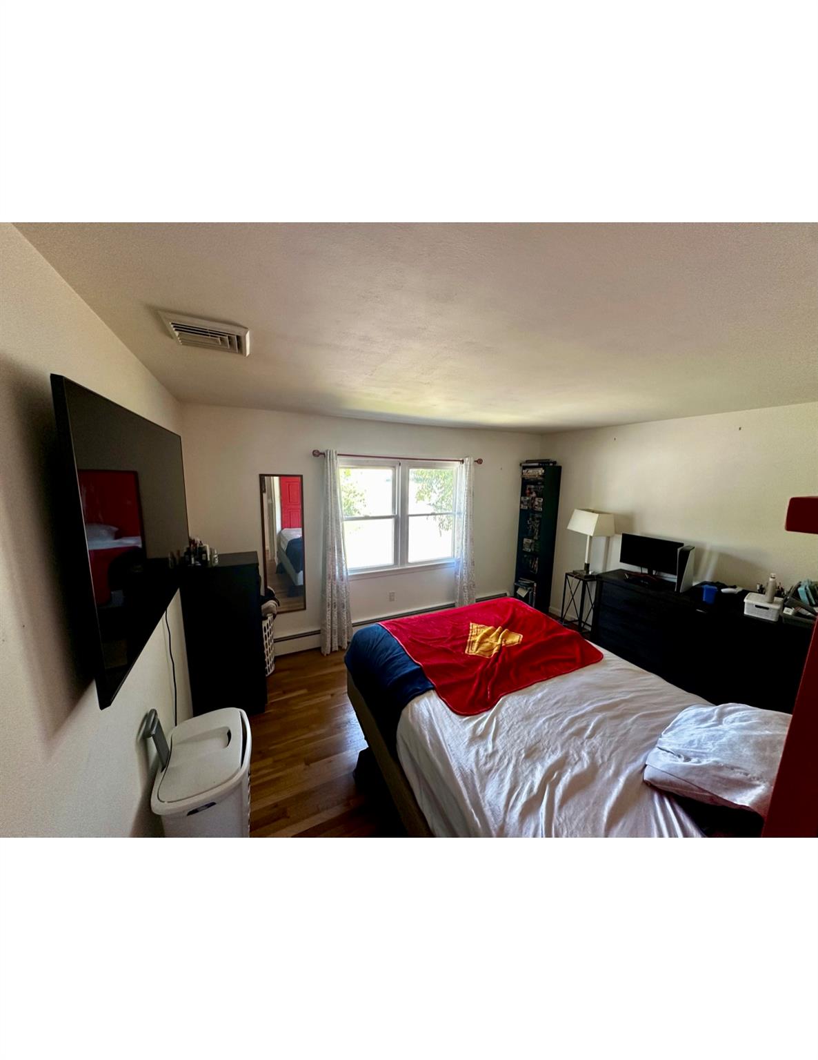 1300 Burlingham Road Pine Bush, NY 12566 - Photo 14 of 23 a living room with furniture and a flat screen tv