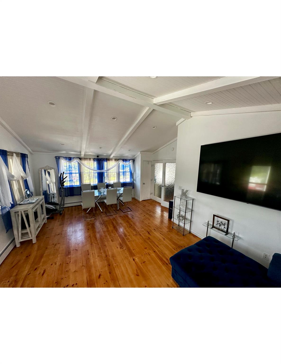 1300 Burlingham Road Pine Bush, NY 12566 - Photo 10 of 23 a living room with furniture and a flat screen tv