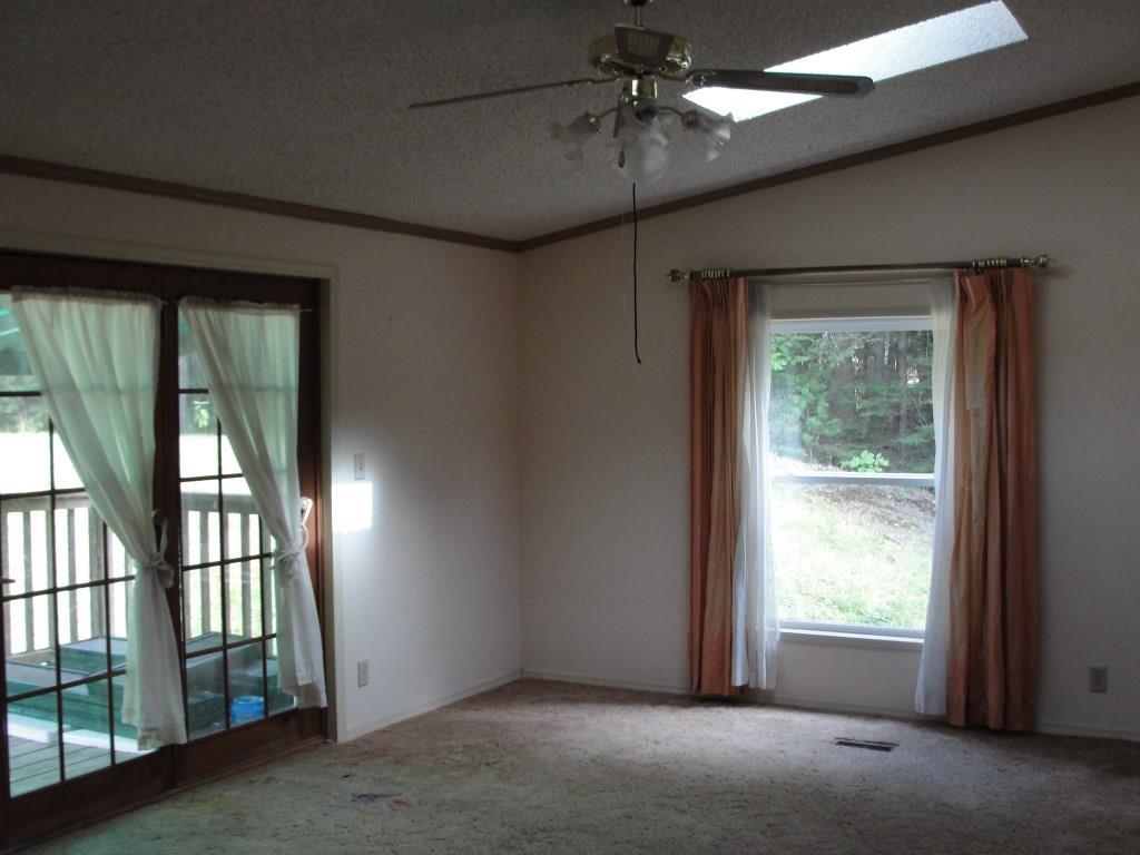134 Town Farm Road Harrison, ME 04040 - Photo 26 of 33 Large living room with brick...