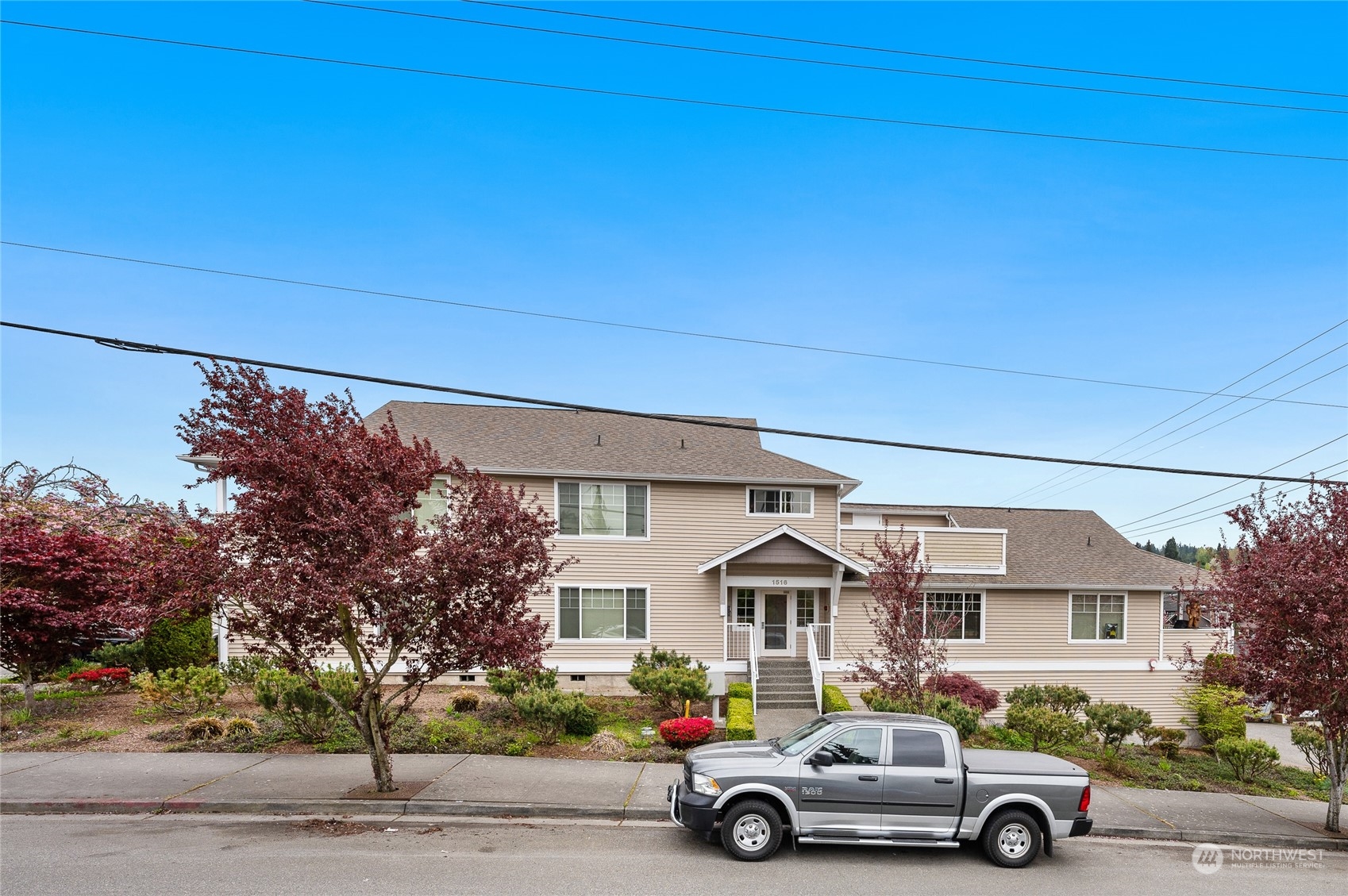 1516 33rd Street Everett, WA 98201 - Photo 3 of 9 a car parked in front of a house