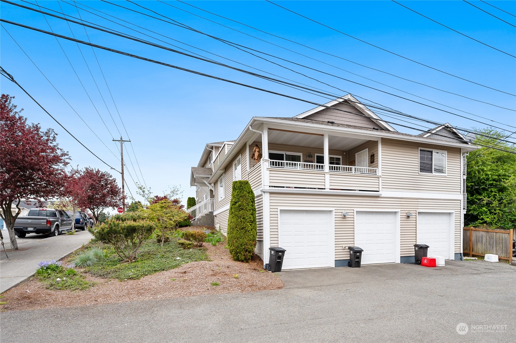 1516 33rd Street Everett, WA 98201 - Photo 9 of 9 a front view of a house with a yard and garage