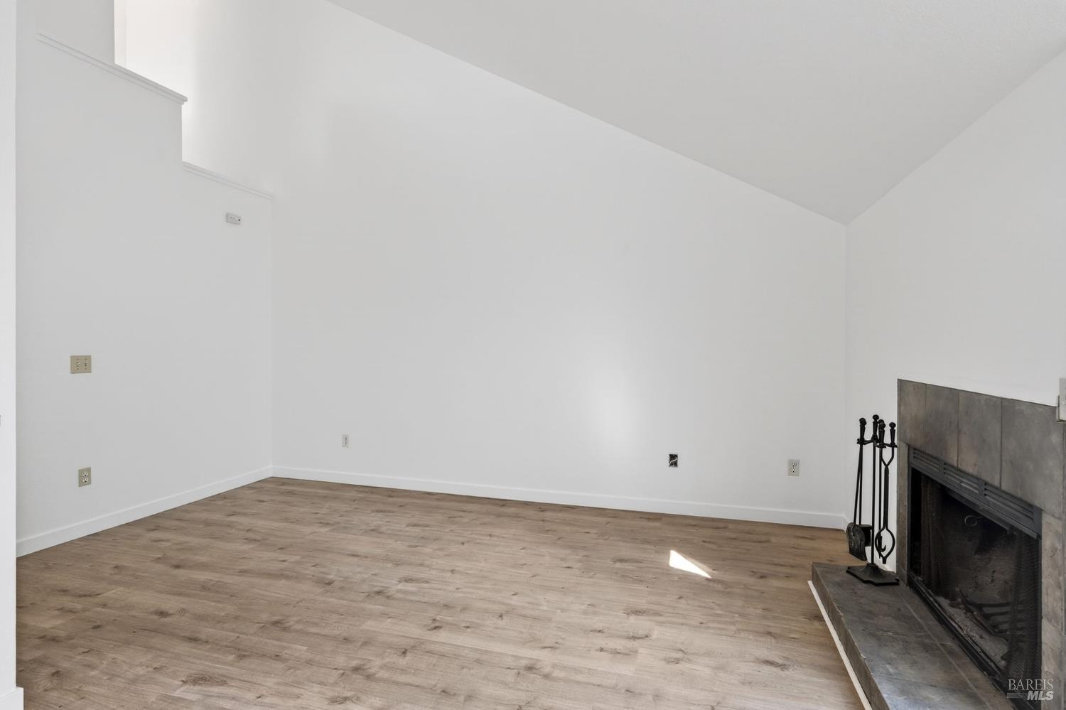 230 Courtyards East Windsor, CA 95492 - Photo 28 of 47 a view of empty room with fireplace