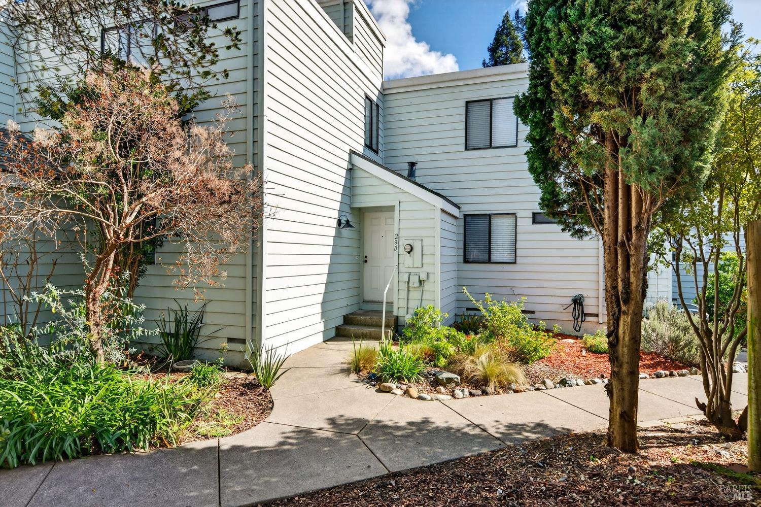 230 Courtyards East Windsor, CA 95492 - Photo 3 of 47 a front view of a house with garden