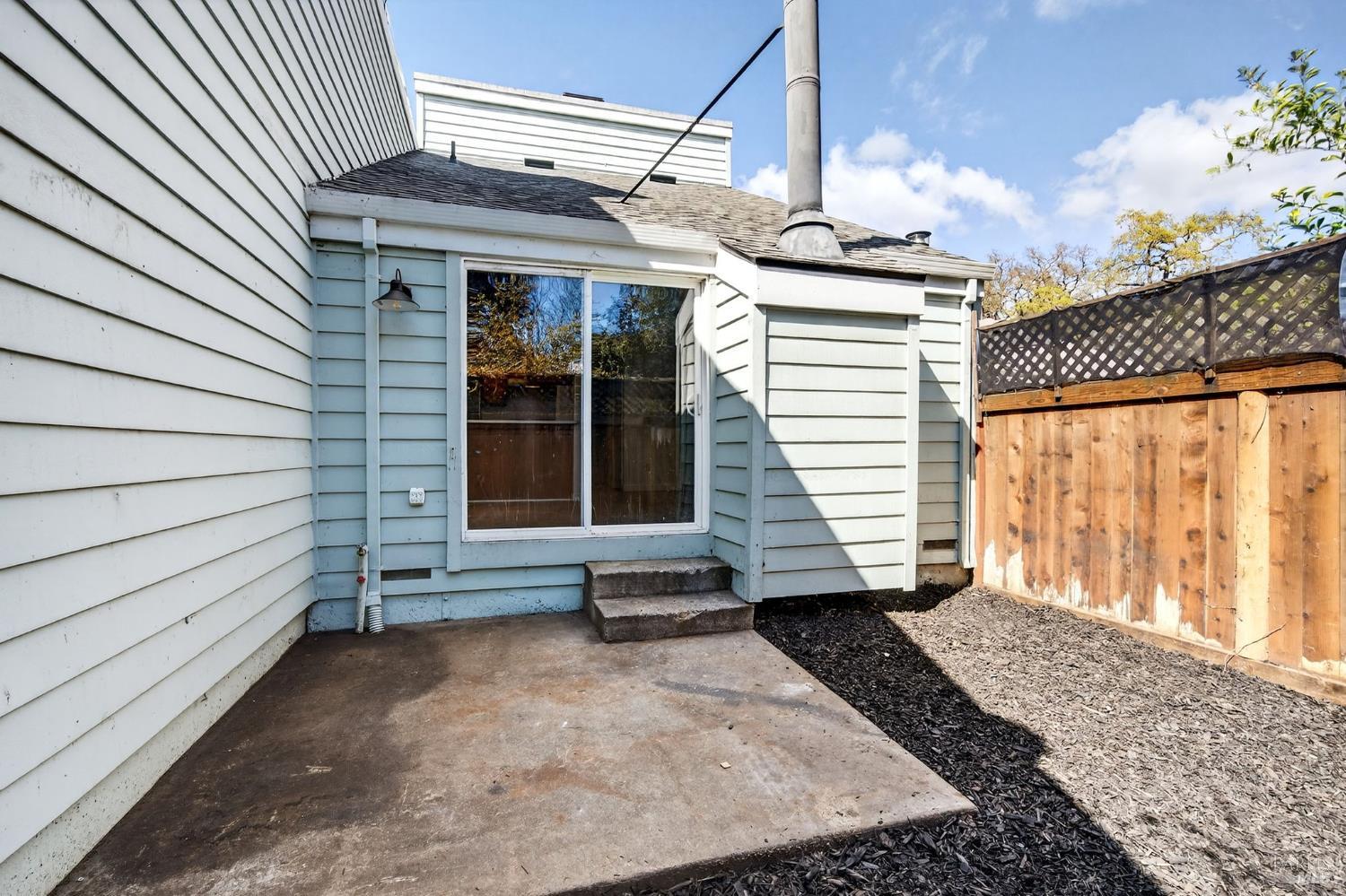 230 Courtyards East Windsor, CA 95492 - Photo 39 of 47 a view of a house with a door and wooden floor