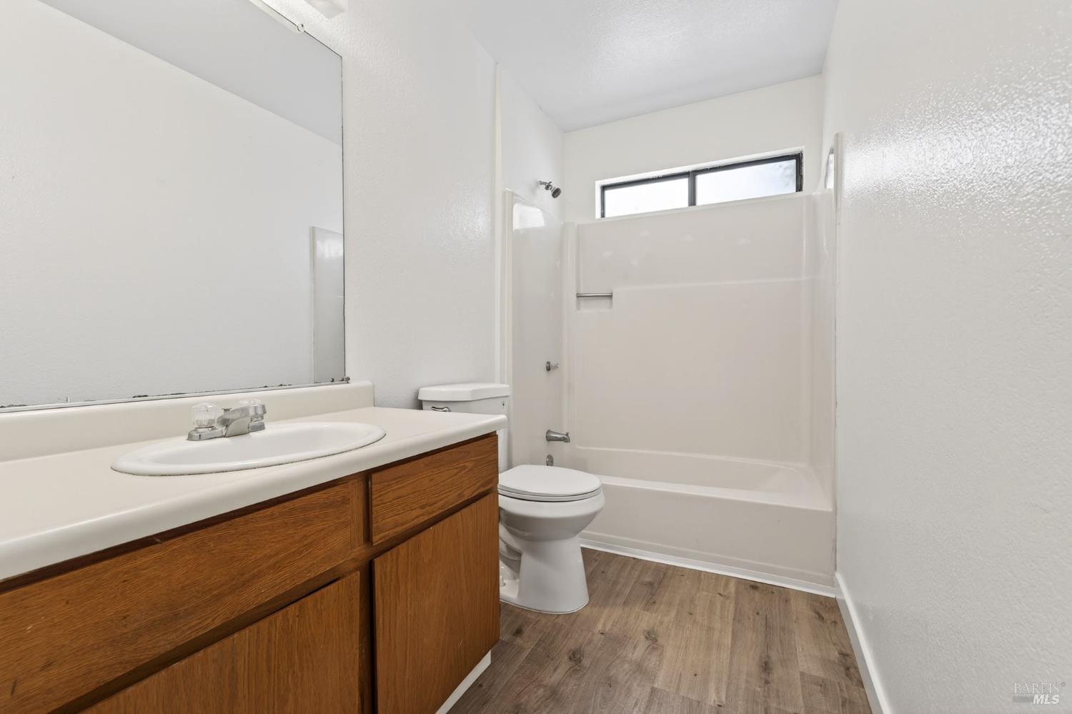 230 Courtyards East Windsor, CA 95492 - Photo 6 of 47 a bathroom with a sink a toilet and shower