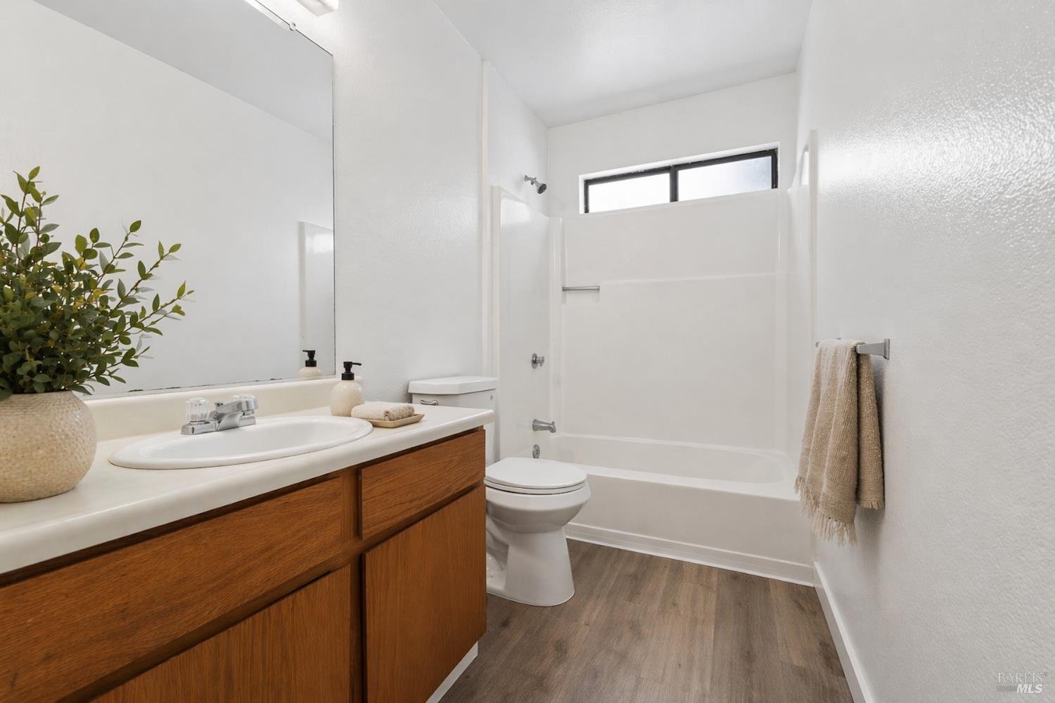 230 Courtyards East Windsor, CA 95492 - Photo 7 of 47 a bathroom with a double vanity sink toilet and shower