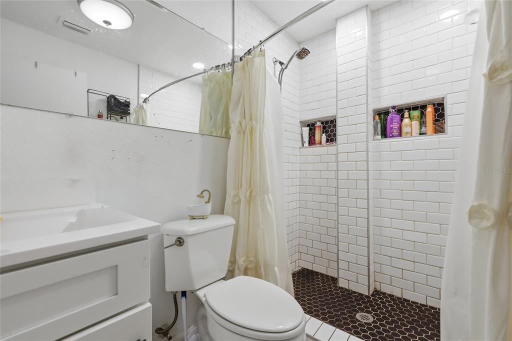 401 Southeast Falcon Road Branford, FL 32008 - Photo 68 of 76 a bathroom with a sink toilet and shower