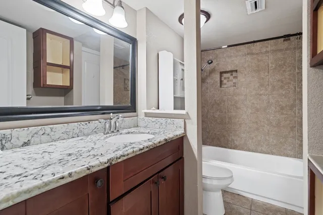 a view of a balcony with a floor to ceiling window