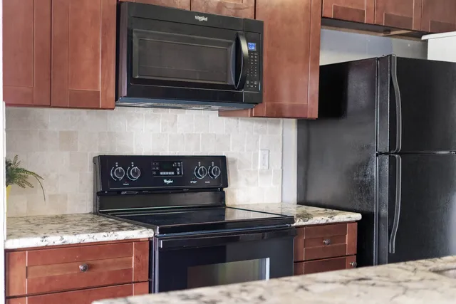 a view of a swimming pool with a lake view