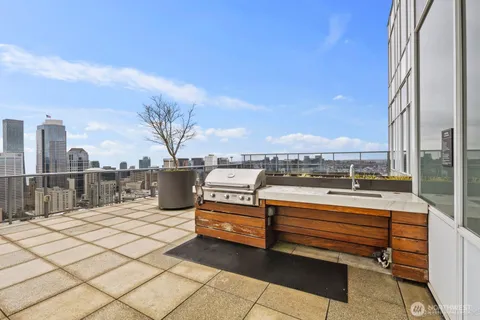 a view of a terrace with sitting area