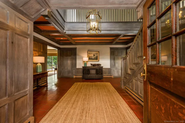 a view of a porch with wooden floor