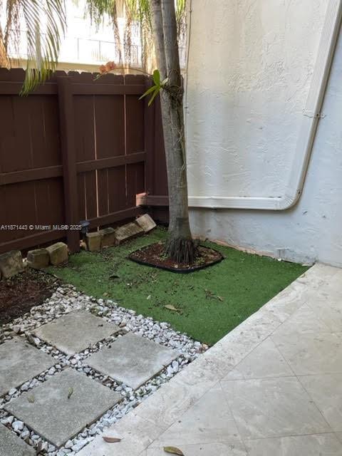 a view of a back yard of the house