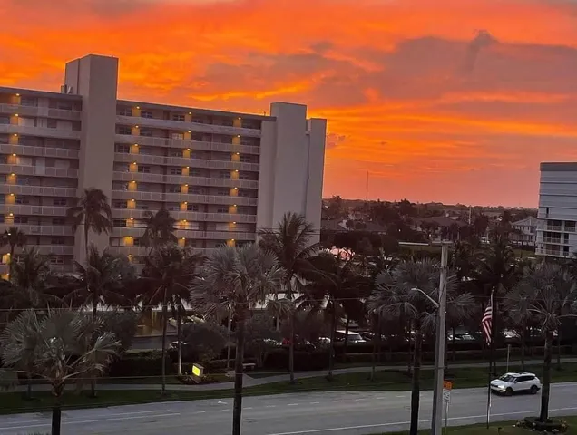 a view of a building with a street