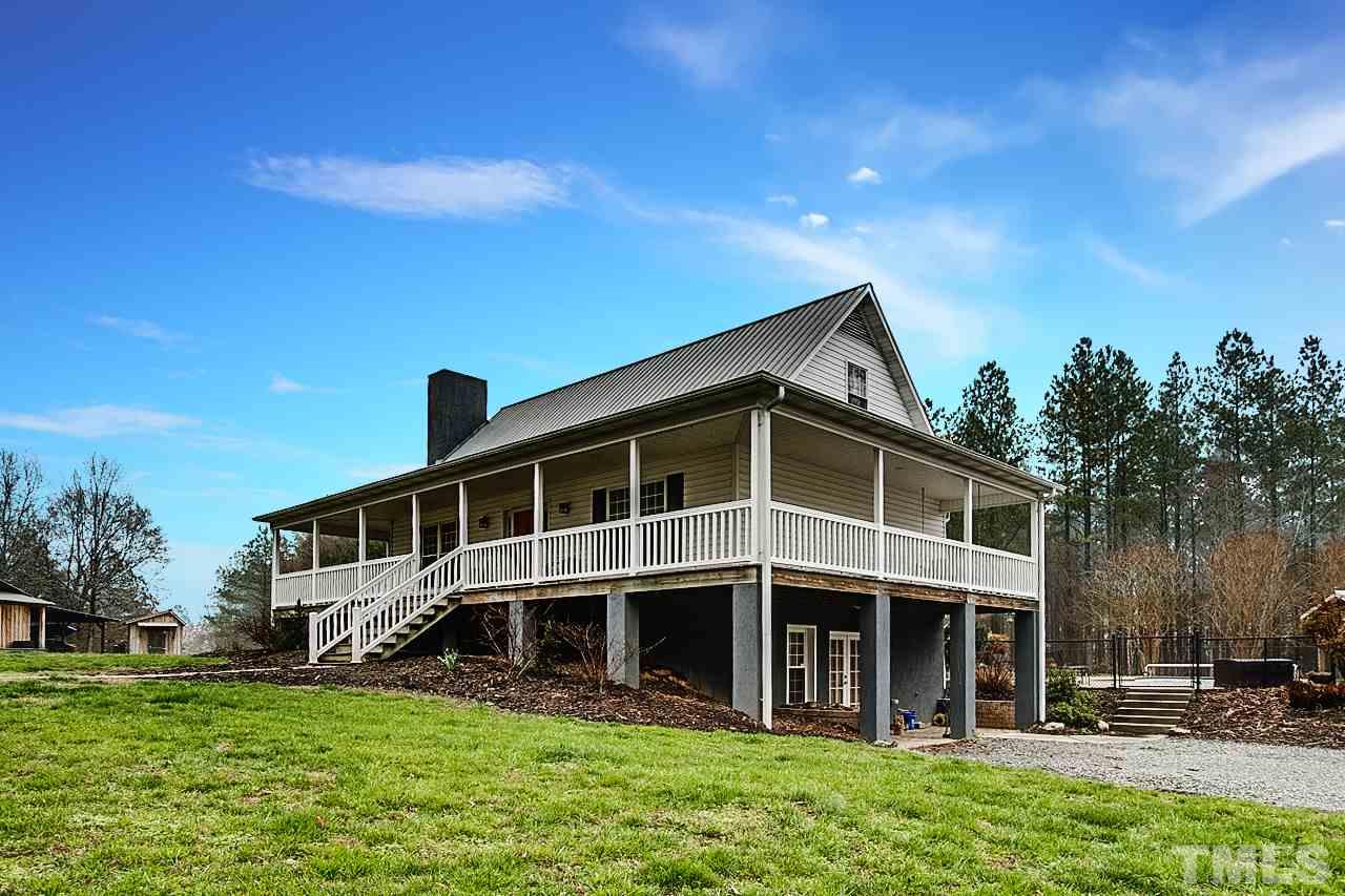 306 Charlie S Road Robbins, NC 27325 - Photo 2 of 30 a view of a house with a yard