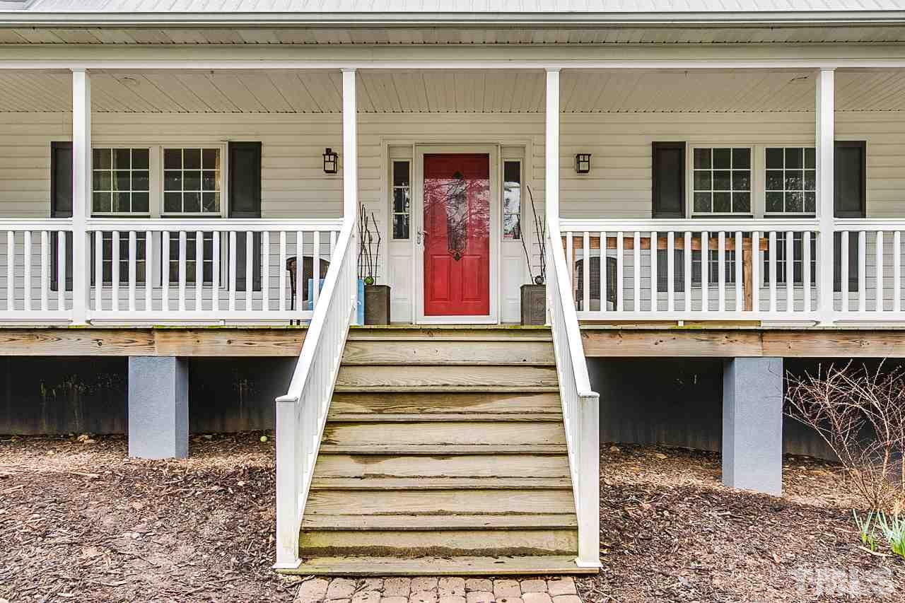 306 Charlie S Road Robbins, NC 27325 - Photo 3 of 30 a front view of a house with a porch