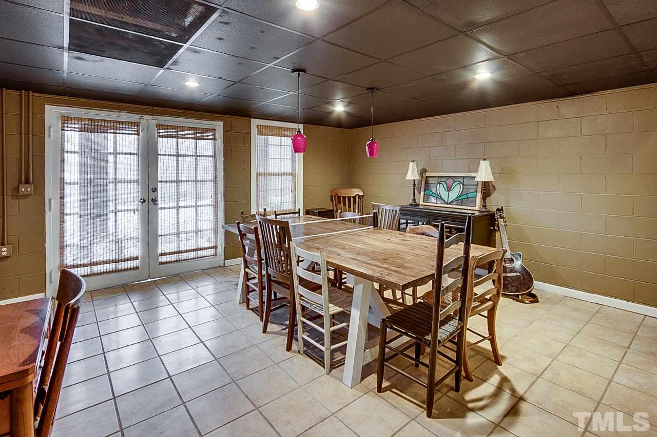 306 Charlie S Road Robbins, NC 27325 - Photo 23 of 30 a table and chairs in a room