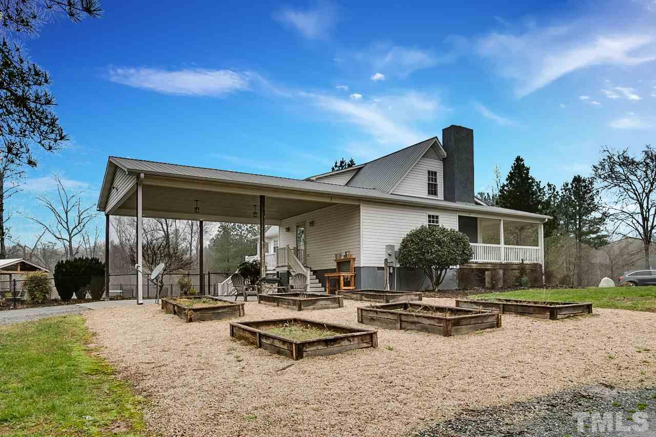 306 Charlie S Road Robbins, NC 27325 - Photo 24 of 30 a front view of a house with a yard