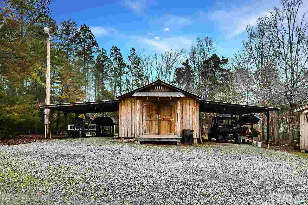 306 Charlie S Road Robbins, NC 27325 - Photo 28 of 30 a view of a car park in front of house
