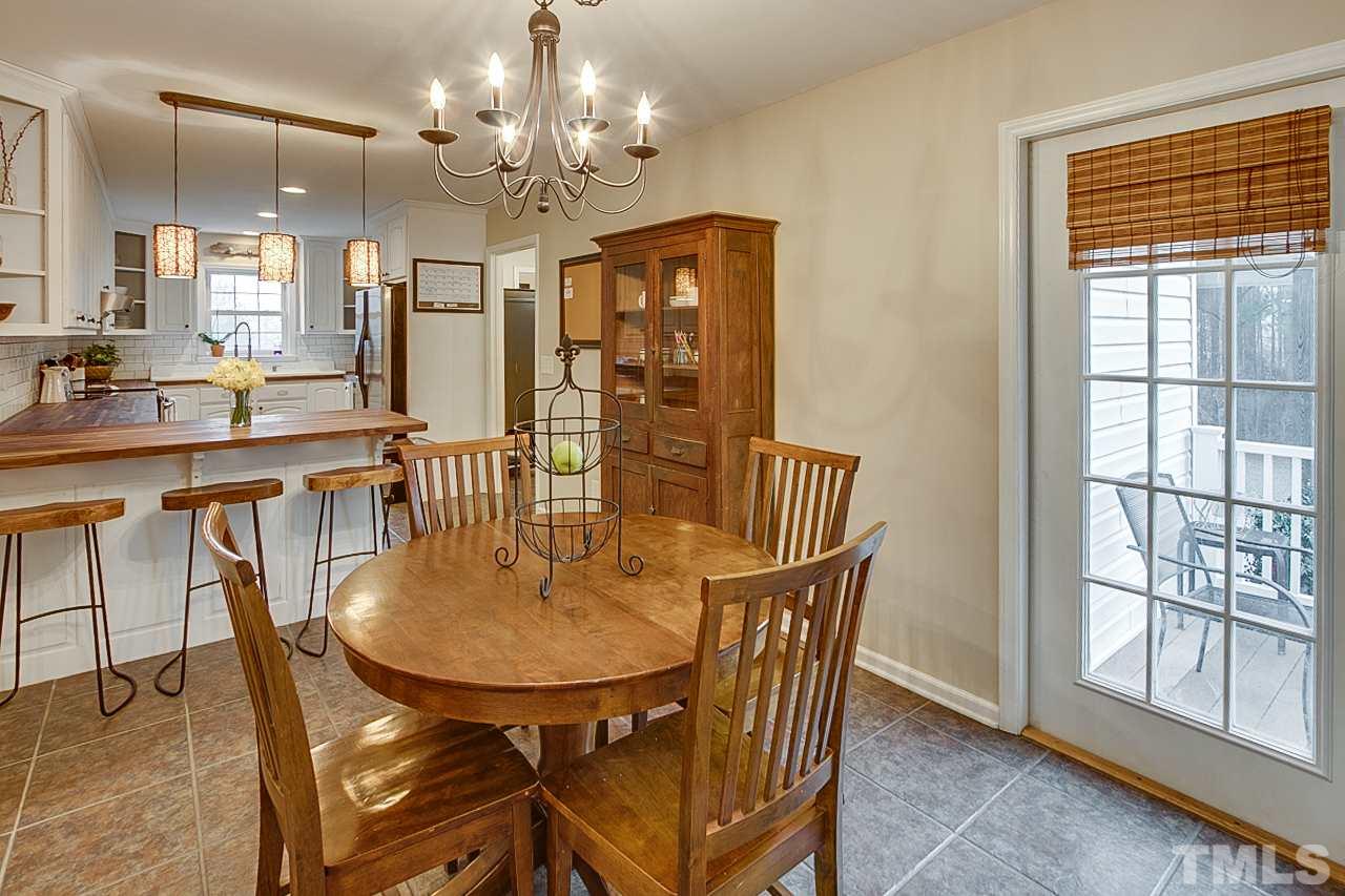 306 Charlie S Road Robbins, NC 27325 - Photo 9 of 30 a view of a a dining room with furniture window and outside view