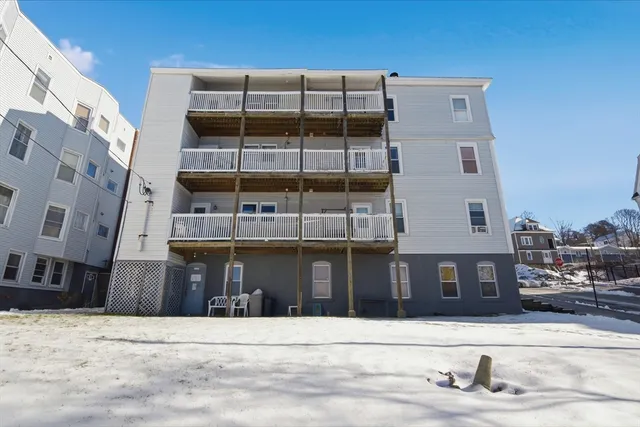 a tall building that has lot of windows on it