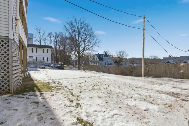 a view of a backyard of snow