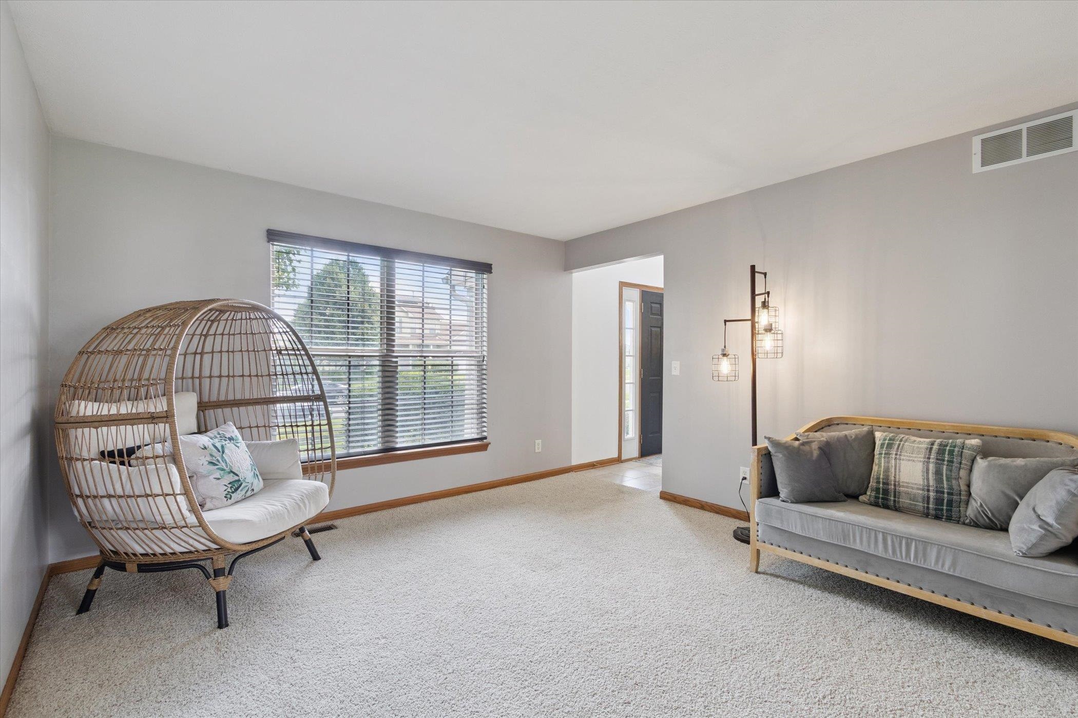 1442 Rock Island Road Davis Junction, IL 61020 - Photo 12 of 63 a living room with furniture and a flat screen tv