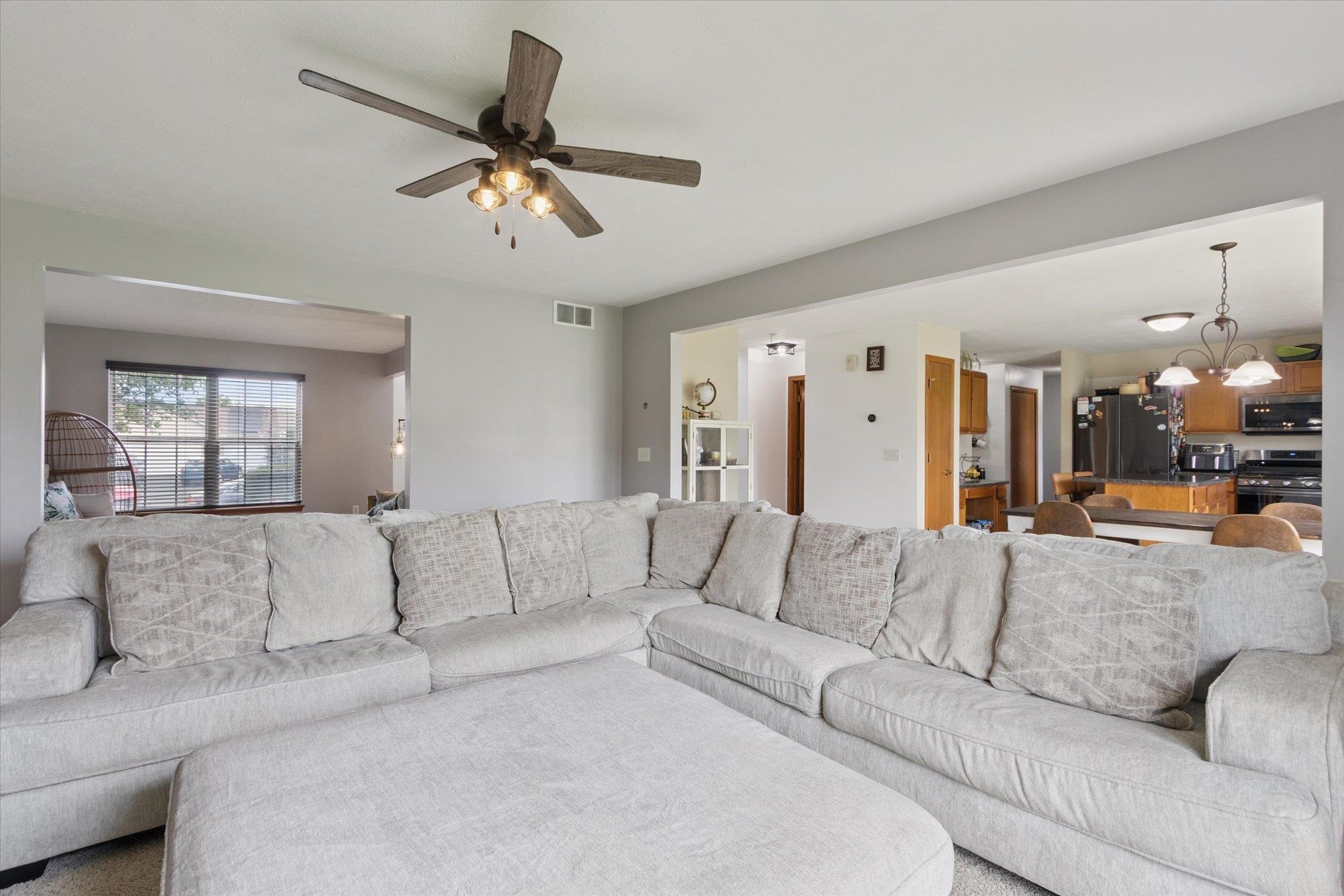 1442 Rock Island Road Davis Junction, IL 61020 - Photo 14 of 63 a living room with furniture and a large window