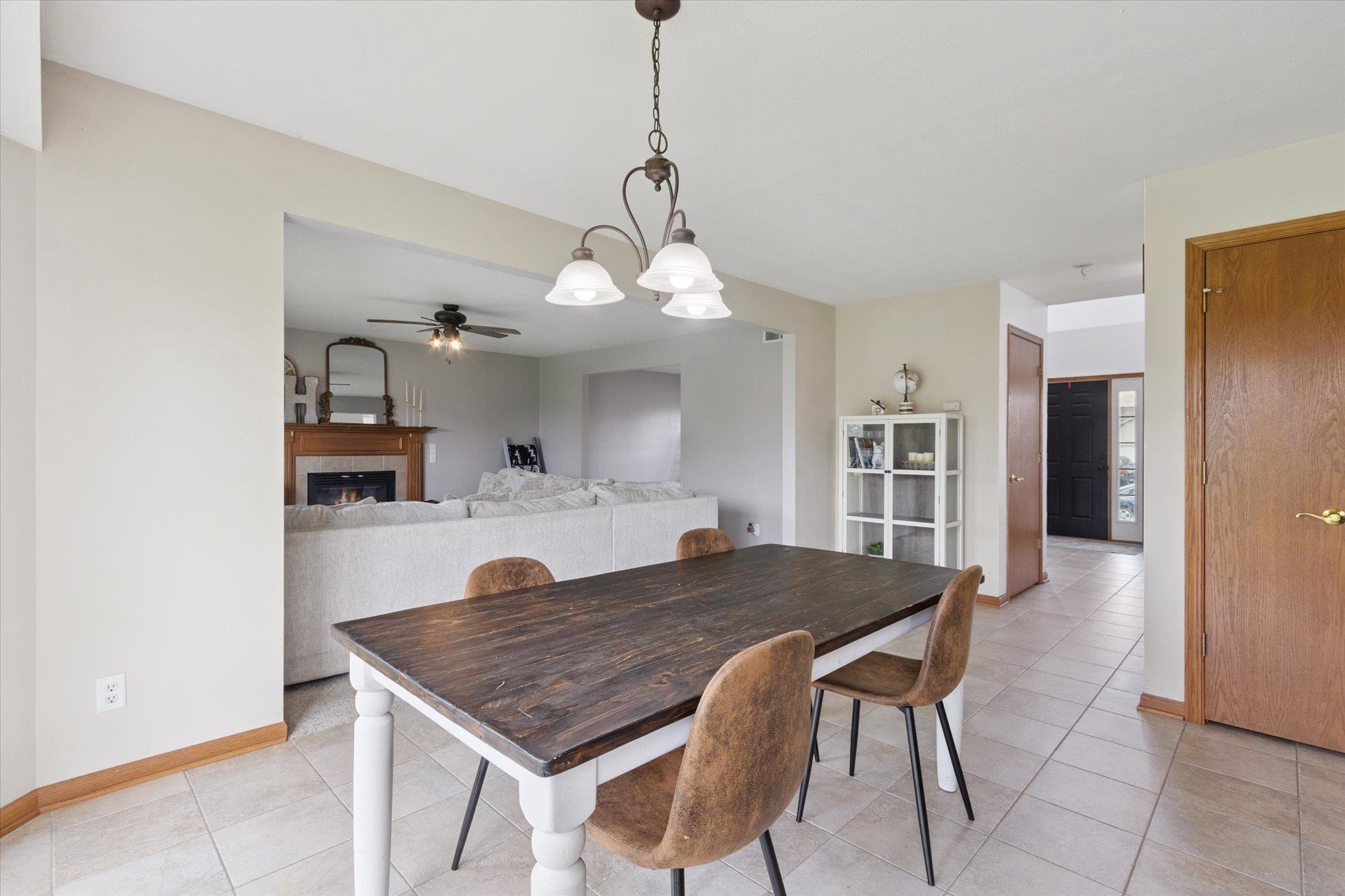 1442 Rock Island Road Davis Junction, IL 61020 - Photo 17 of 63 a kitchen with a table and chairs in it