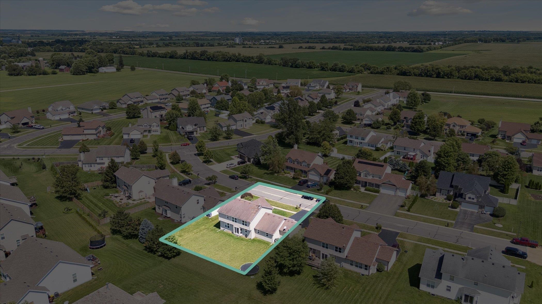 1442 Rock Island Road Davis Junction, IL 61020 - Photo 2 of 63 an aerial view of a house with a garden