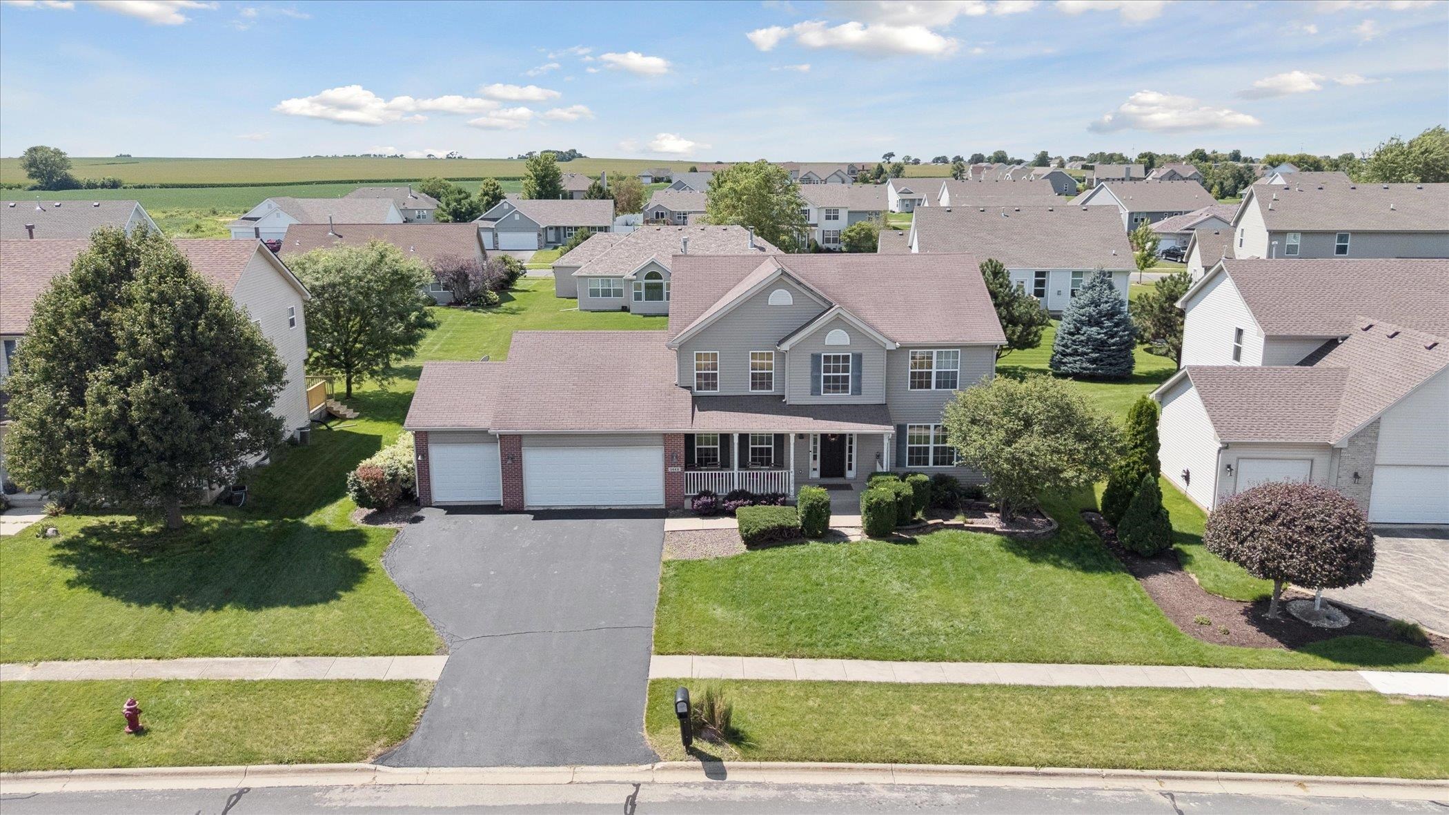 1442 Rock Island Road Davis Junction, IL 61020 - Photo 3 of 63 an aerial view of a house