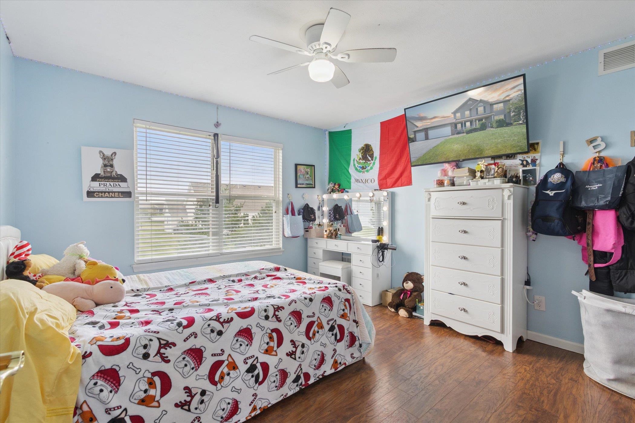 1442 Rock Island Road Davis Junction, IL 61020 - Photo 37 of 63 a bedroom with a bed and a dresser