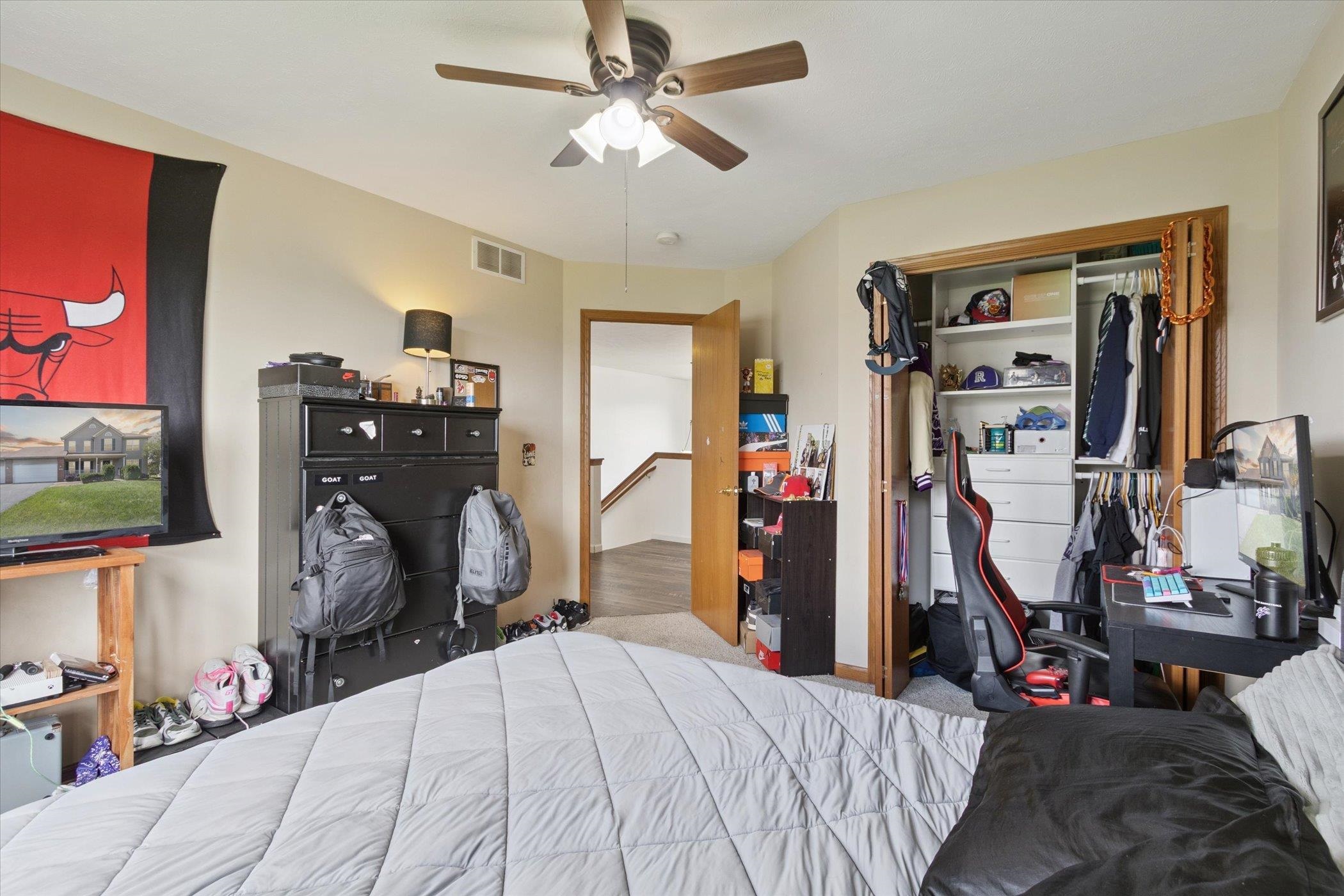 1442 Rock Island Road Davis Junction, IL 61020 - Photo 40 of 63 a bedroom with bed and a flat tv screen