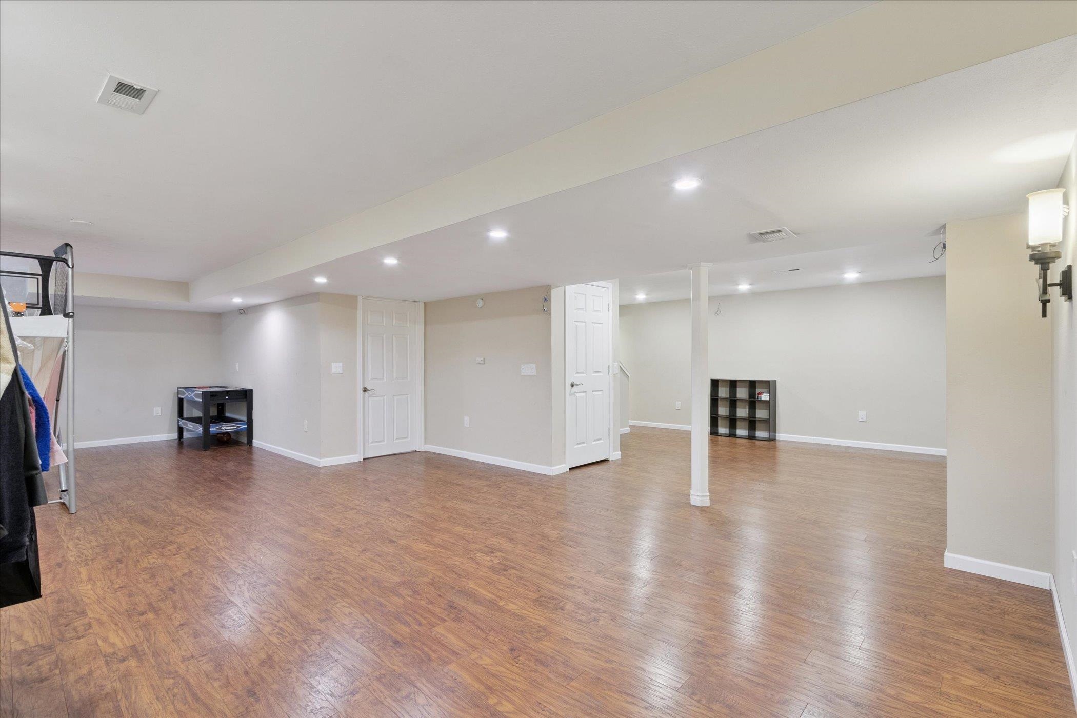 1442 Rock Island Road Davis Junction, IL 61020 - Photo 43 of 63 a view of an empty room with wooden floor