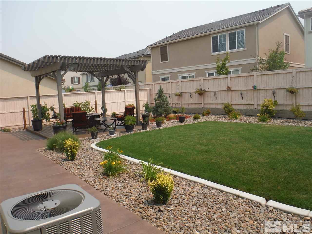 2130 Blue Oaks Drive Reno, NV 89521 - Photo 17 of 20 a front view of a house with a yard
