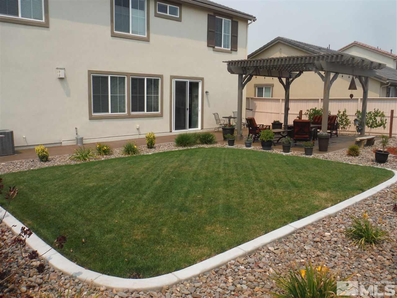 2130 Blue Oaks Drive Reno, NV 89521 - Photo 18 of 20 a view of a house with a backyard
