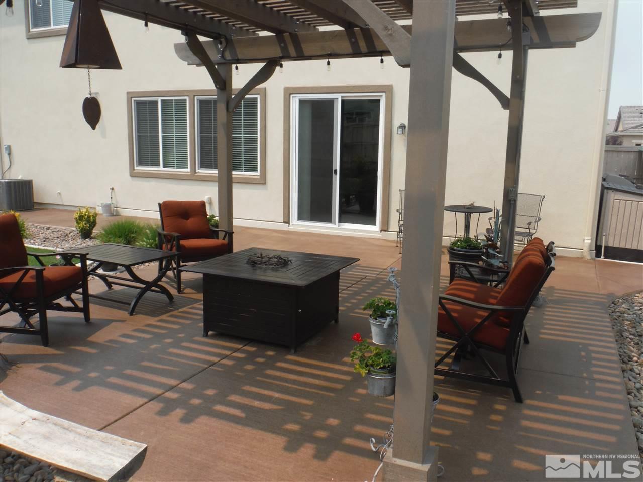 2130 Blue Oaks Drive Reno, NV 89521 - Photo 20 of 20 a front view of a house with outdoor seating