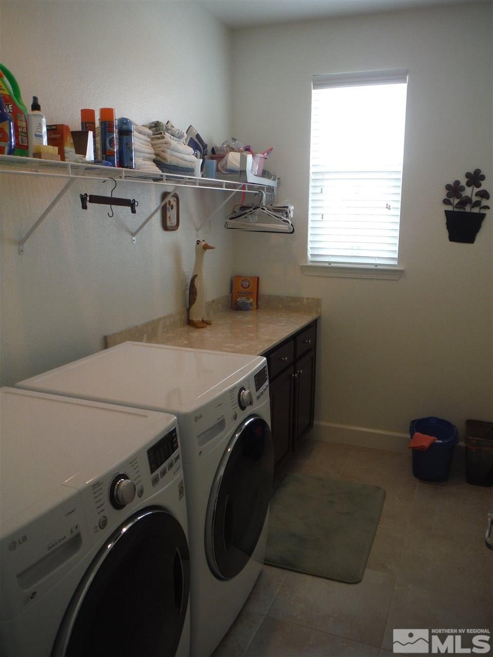 2130 Blue Oaks Drive Reno, NV 89521 - Photo 7 of 20 a utility room with dryer and washer