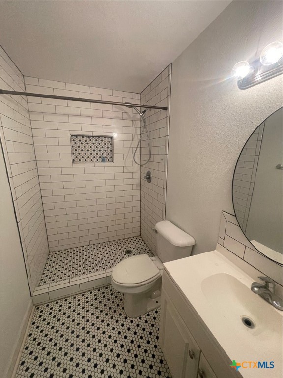 1605 Bexar Avenue Victoria, TX 77901 - Photo 8 of 12 a bathroom with a sink a toilet and shower