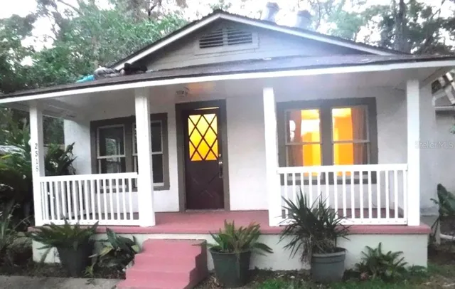 a porch with seating space