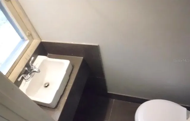 a bathroom with a toilet