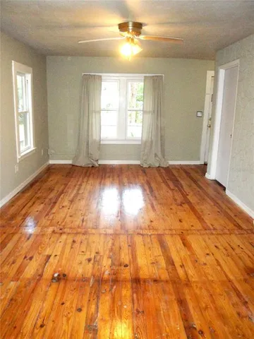 a view of an empty room and window