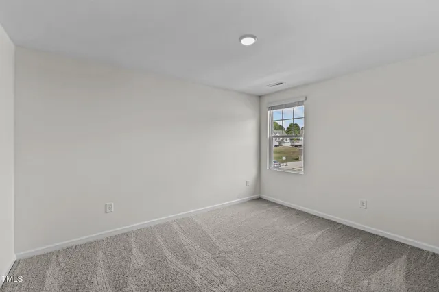 a view of a room with white wall