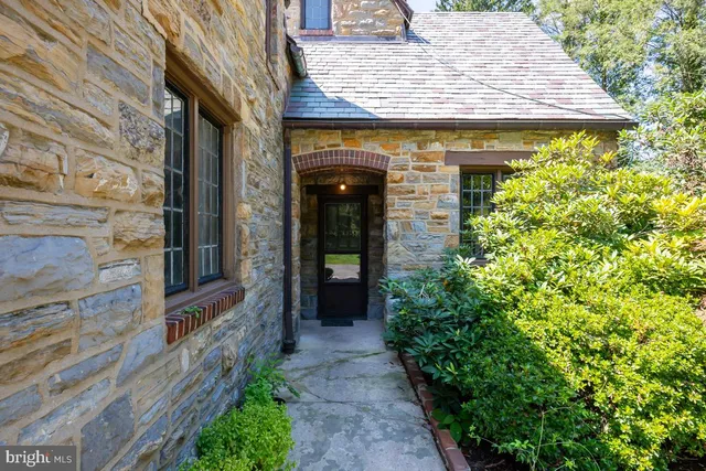 a view of a pathway door of the house