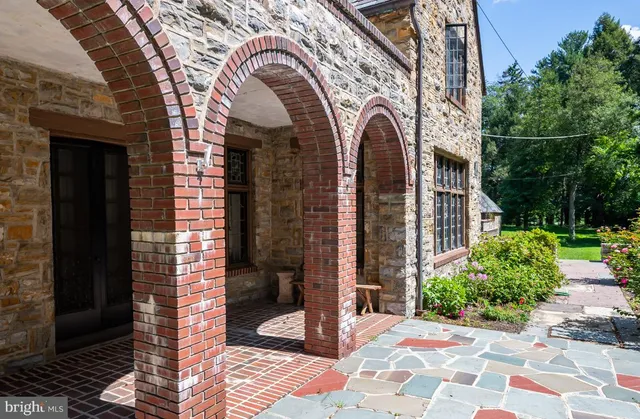 a view of entrance gate of a house