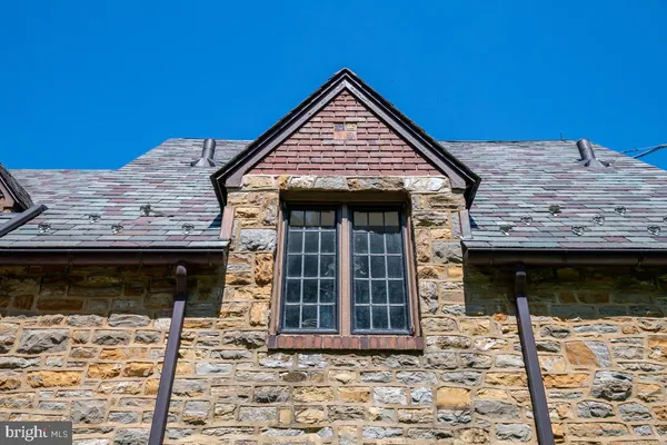 a view of a wooden house with a large window