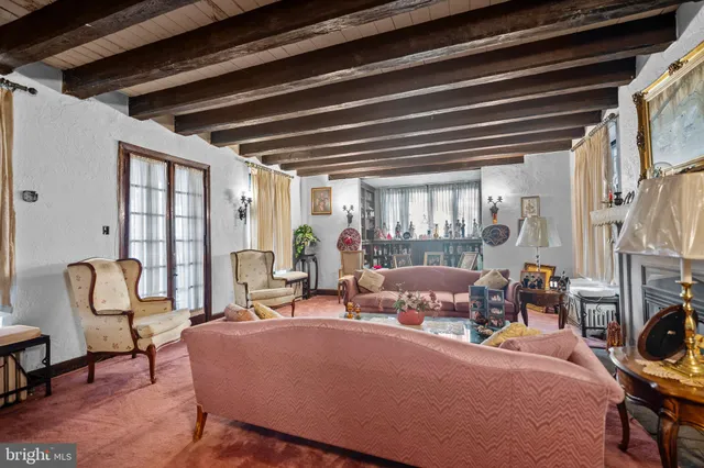 a bed room with furniture and a window