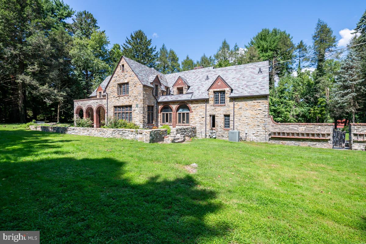 1804 Bernville Road Reading, PA 19601 - Photo 3 of 34 a front view of a house with a yard table and chairs
