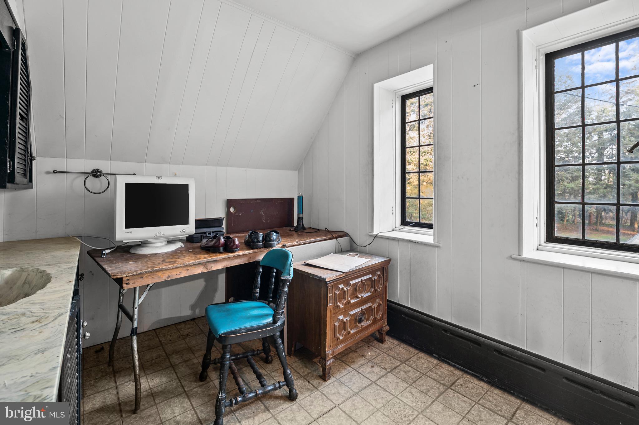 1804 Bernville Road Reading, PA 19601 - Photo 31 of 34 a view of a workspace with furniture and a window
